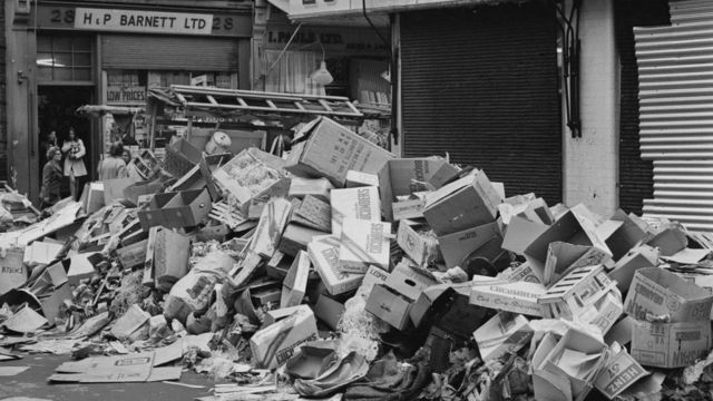 Piles of trash on the streets of London in 1970.