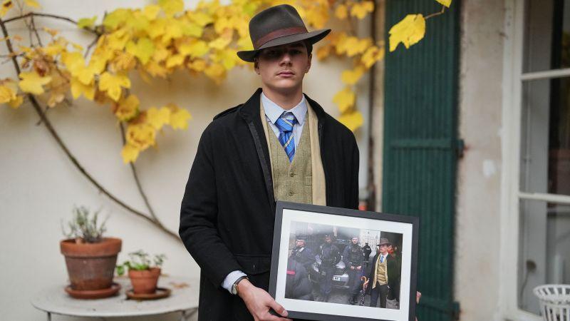 The Louvre's 'fedora man' exposed: Meet the teenage stylish dresser that was cracked at the scene of...