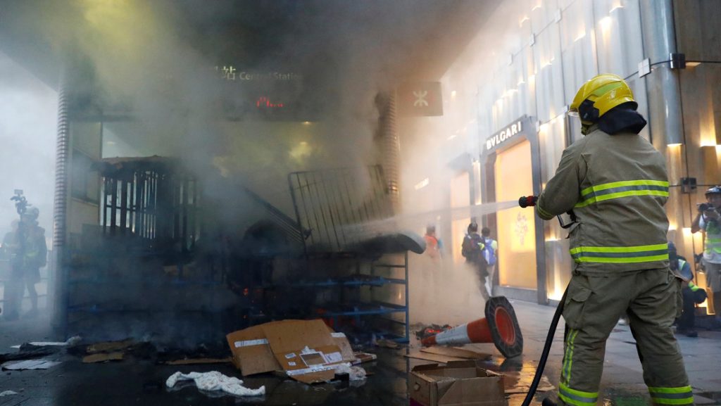 About 300 people are trapped in a massive fire in a shopping center in Hong Kong